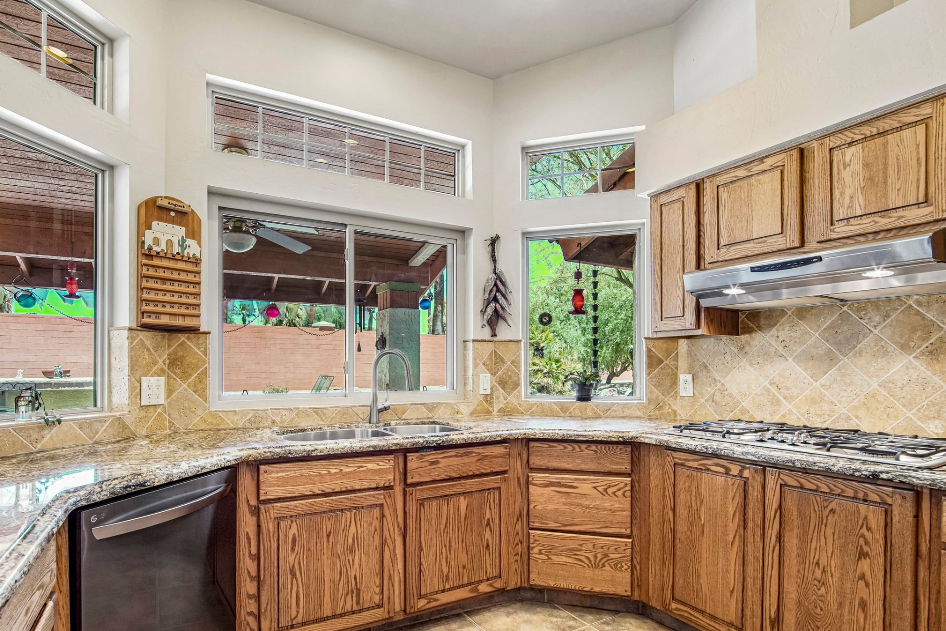 Kitchen with granite countertops and natural light