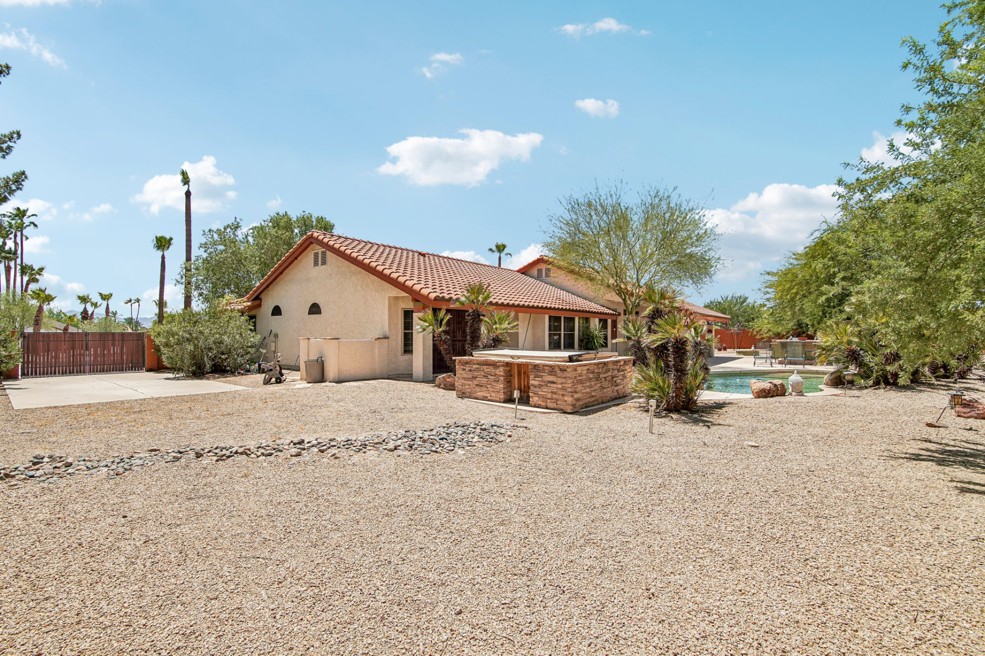 Side yard with gated RV access on the half acre